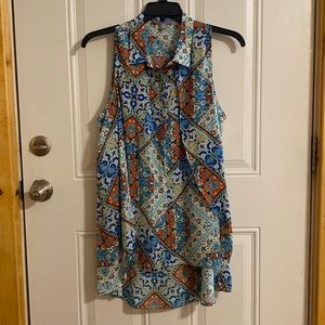 Valerie Stevens sleeveless, button down shirt.